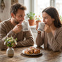 happy-couple-holding-minimalist-line-art-matching-mugs