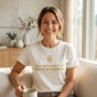 Modern American mom wearing white architect of grace tee in sunny Japandi interior