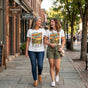 50 year old mom and adult daughter wearing mama homeland tee