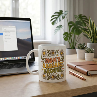 Mom's radiant groove mug on a modern desk with laptop