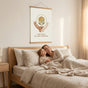 A large 16x24 inch horizontal poster featuring a loving mother-and-child design on LexJet paper, clipped to a bedroom wall above a mother and child hugging on a linen-dressed bed.